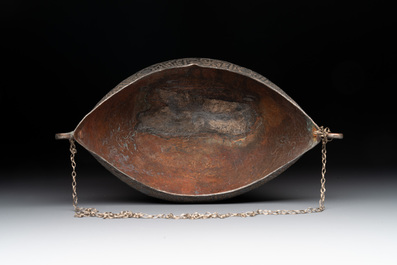 A tinned copper 'kashkul' or begging bowl, a calligraphic bowl and a brass covered jar, Iran, 18/19th C.