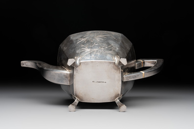 A Chinese silver covered teapot, sugar jar and milk jug with bamboo design, Tackhing 90% silver mark, 20th C.