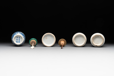 Four Chinese blue, white and copper-red snuff bottles, Yongzheng mark, 19th C.