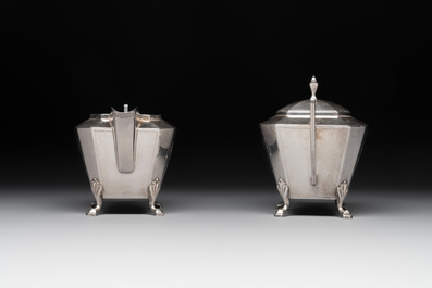 A Chinese silver covered teapot, sugar jar and milk jug with bamboo design, Tackhing 90% silver mark, 20th C.