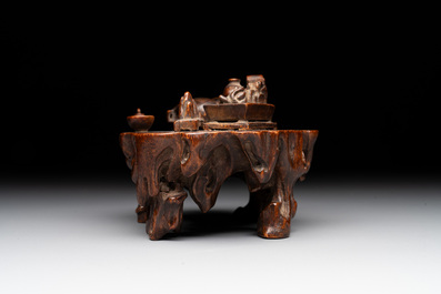 A Chinese agarwood carving of a miniature table with antiquities, 18/19th C.