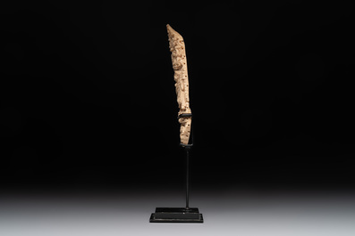 A Tibetan carved bone apron ornament with a dakini, 19th C.