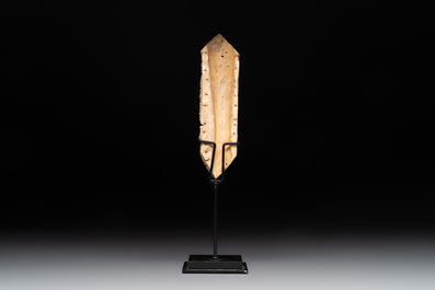 A Tibetan carved bone apron ornament with a dakini, 19th C.