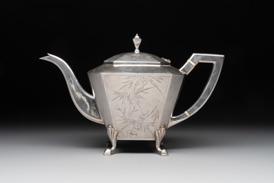 A Chinese silver covered teapot, sugar jar and milk jug with bamboo design, Tackhing 90% silver mark, 20th C.