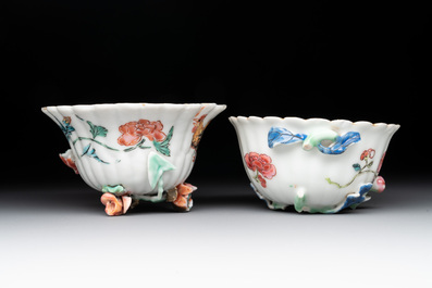 A Chinese famille rose 'rooster' teapot with applied floral design, two cups and a saucer, Yongzheng/Qianlong
