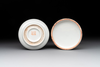 A Chinese famille rose seal paste box and a covered jarlet, a miniature wucai vase and a blue and white snuff bottle, Kangxi mark, 19/20th C.