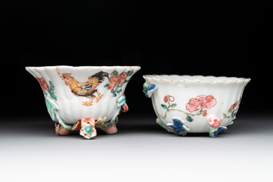 A Chinese famille rose 'rooster' teapot with applied floral design, two cups and a saucer, Yongzheng/Qianlong