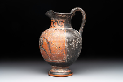 A Greek terracotta 'Oenochoe' vase with Hephaestus and Silenus, Roman era