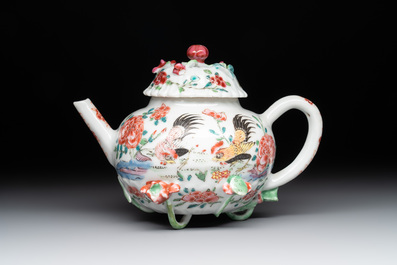A Chinese famille rose 'rooster' teapot with applied floral design, two cups and a saucer, Yongzheng/Qianlong