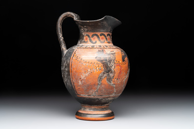 A Greek terracotta 'Oenochoe' vase with Hephaestus and Silenus, Roman era