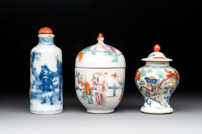 A Chinese famille rose seal paste box and a covered jarlet, a miniature wucai vase and a blue and white snuff bottle, Kangxi mark, 19/20th C.