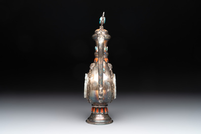 A Chinese jade-inset and hardstone-inlaid silver ewer and cover in Mongolian style, 19th C.