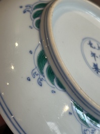 A Chinese doucai 'dragon and carps' plate, Chenghua mark, Yongzheng