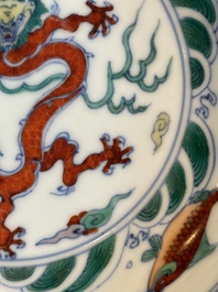 A Chinese doucai 'dragon and carps' plate, Chenghua mark, Yongzheng