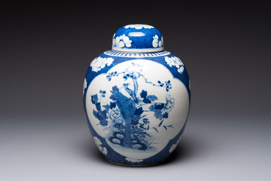 A pair of Chinese blue and white bronze-mounted vases and a covered jar, 19th C.