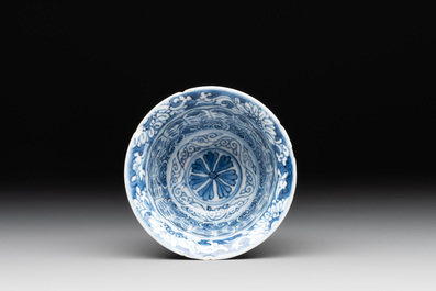 A Chinese blue and white reticulated double-walled cup and saucer, fu mark, Kangxi