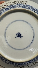 Two Chinese blue and white 'reticulated border' plates, Kangxi