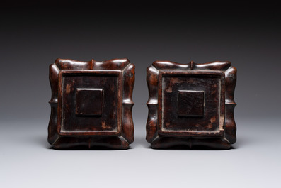 A pair of Chinese verte biscuit covered square jars on wooden stand, 19th C.