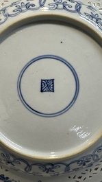 Two Chinese blue and white 'reticulated border' plates, Kangxi