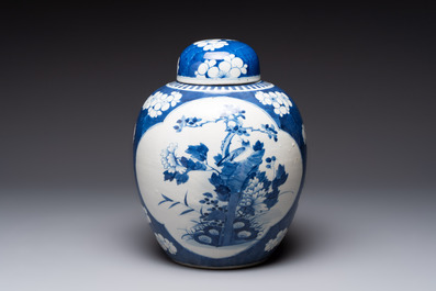 A pair of Chinese blue and white bronze-mounted vases and a covered jar, 19th C.