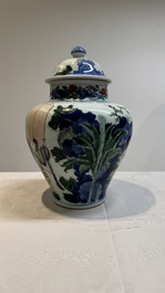 A Chinese wucai vase and cover with court ladies and playing boys, Transitional period