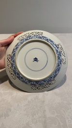 Two Chinese blue and white 'reticulated border' plates, Kangxi
