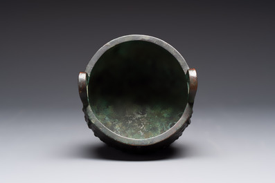 A Chinese archaic bronze ritual tripod food vessel, 'ding 鼎', Western Zhou
