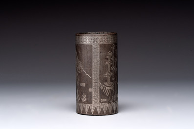 A Chinese bronze tripod censer with cover and stand, a small tripod censer and a silver-inlaid iron brush pot, 19/20th C.