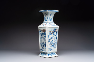 A Chinese blue, white and copper-red square-sectioned vase with figural design, Kangxi