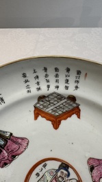 A pair of Chinese famille rose 'Wu Shuang Pu' plates, 19th C.