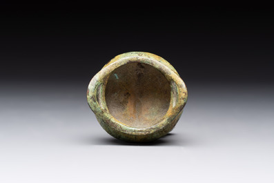 A Chinese bronze tripod censer with cover and stand, a small tripod censer and a silver-inlaid iron brush pot, 19/20th C.
