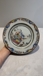 A fine pair of Chinese gilt-decorated famille rose 'Autumn' plates with troubadours, Qianlong