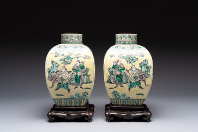 A pair of Chinese verte biscuit covered square jars on wooden stand, 19th C.