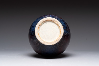 A Chinese flamb&eacute;-glazed bottle vase, 19th C.