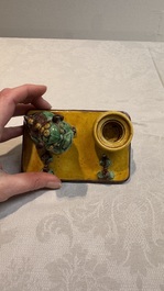 A pair of Chinese sancai-glazed Buddhist lions and an inkwell, 19th C.