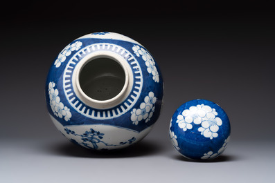 A pair of Chinese blue and white bronze-mounted vases and a covered jar, 19th C.