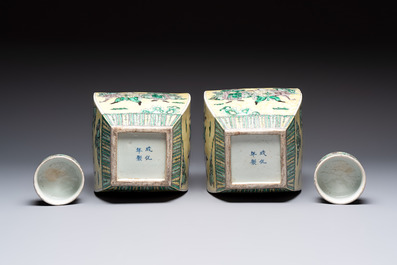 A pair of Chinese verte biscuit covered square jars on wooden stand, 19th C.