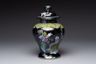 A Chinese famille rose black-ground covered vase and a famille rose Milefo Buddha, Mao Ji Sheng 茂記生造 mark, 19/20th C.