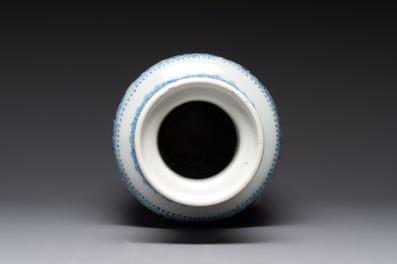 A Chinese blue and white 'flower scrolls' rouleau vase, Kangxi