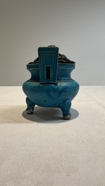 A Chinese turquoise-glazed tripod censer with wooden cover, Ming