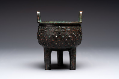 A Chinese archaic bronze ritual tripod food vessel, 'ding 鼎', Western Zhou