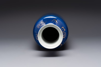 A Chinese gilt-decorated powder-blue 'dragon and phoenix' rouleau vase, 19th C.