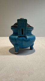 A Chinese turquoise-glazed tripod censer with wooden cover, Ming