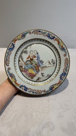 A fine pair of Chinese gilt-decorated famille rose 'Autumn' plates with troubadours, Qianlong