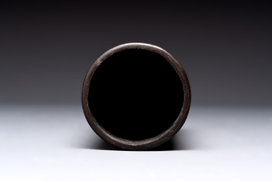 A Chinese bronze tripod censer with cover and stand, a small tripod censer and a silver-inlaid iron brush pot, 19/20th C.
