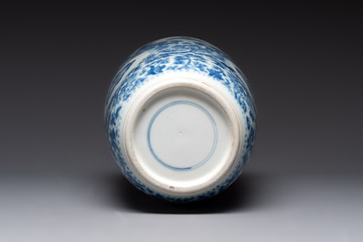 A Chinese blue and white 'flower scrolls' rouleau vase, Kangxi