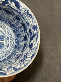 A Chinese blue and white reticulated double-walled cup and saucer, fu mark, Kangxi