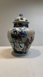 A Chinese wucai vase and cover with court ladies and playing boys, Transitional period