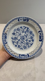 Two Chinese blue and white 'reticulated border' plates, Kangxi