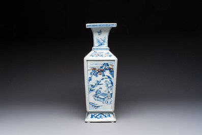 A Chinese blue, white and copper-red square-sectioned vase with figural design, Kangxi